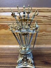 Vintage Toledo Spain brass & enamel 24 Sword Cocktail Appetizer Picks w/stand picture