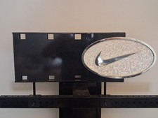 Authentic Nike Retail Store Display Fixture - 2-Sided Metallic Swoosh plaque picture