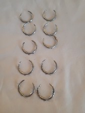 Package of 10 vintage chromes Cadillace wreath emblems NOS 1.5