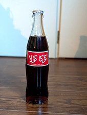 Coca-Cola Classic Soda Glass Bottle 355ml Arabic Label Red Black Clear 2004 picture