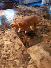 Hand Carned Wooden Lion. 2  1/2 Inch Tall 7 Inches Long. picture
