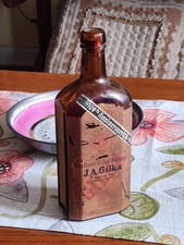VTG J.A. GILKA BERLINER KUMMEL EMBOSSED AMBER LIQUOR BOTTLE BERLIN 30s picture