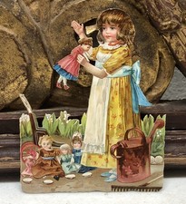 Victorian Die Cut Scrap of Girl in Dress w/ Dolls Flowers - L4 picture