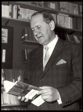 The Italian writer psychiatrist Mario Tobino browsing through a co- Old Photo picture