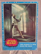 1977 Topps Star Wars #43 Luke prepares to swing across the chasm picture