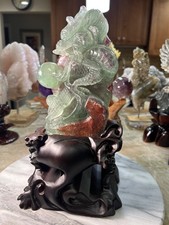 Dragon candy Fluorite UV reactive carving with custom wood stand picture