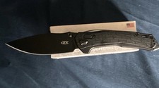 ZT 0203 Duralock Pocketknife CPM-M4 Black Drop Point Plain Edge G10 picture