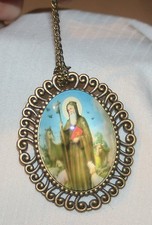 Lovely Swirl Rim Brasstone St Benedict in Nature Glass Cameo Necklace Brooch Pin picture