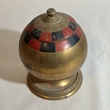 MID CENTURY MODERN VINTAGE BRASS TONE GLOBE ROULETTE CIGARETTE HOLDER CASE picture