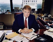 American businessman Donald Trump poses for a in his New York offi- Old Photo picture