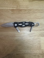 Retired Leatherman e303 Multi Tool Pocket Knife Combo Blade Screwdrivers picture