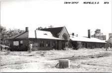 C&NW Railroad Train Station Depot Redfield, SD South Dakota Postcard RR Tracks picture