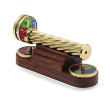 Brass Kaleidoscope with Detachable Pattern Wheels – Displayed on Wooden St picture