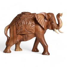 Exquisite Hand-Carved Wooden Elephant Sculpture with Elaborate Costuming picture