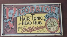 VINTAGE 1930s VIGORATOR HAIR TONIC AND HEAD RUB METAL PORCELAIN SIGN picture