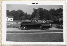 2 vintage photos man woman 1952 1953 Chevy deluxe car picture