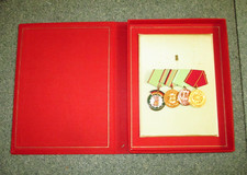 East German DDR Four Rare VioPo Original medals mounted and cased picture