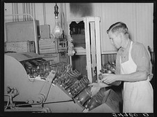 Photo:Tom Green County Texas Dairy Worker 1939 Bottling Milk FSA Texture picture