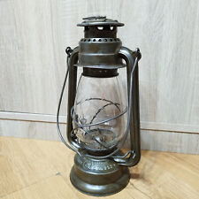 Old kerosene lantern FEUERHAND 252 Germany glass DITMAR hand holding a torch picture