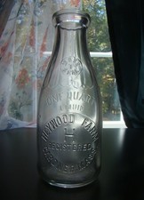 Vintage HEYWOOD FARM- GARDNER, MASS. Quart Milk Bottle picture