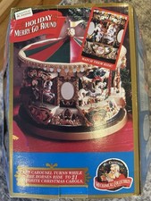 Vintage Village Holiday Carousel 1994 - New in box never opened - Plays 21 songs picture