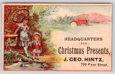 1880-90's J GEO HINTZ HEADQUARTERS for CHRISTMAS PRESENTS VICTORIAN TRADE CARD picture