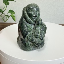 Vintage A Wolf Original Carved Eskimo Adult Holding Seal Handmade in Canada picture