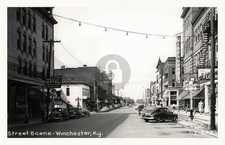Winchester KY Downtown St. Scene w Cars Businesses and Pedest RPPC Postcard COPY picture