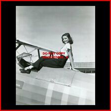 GENE TIERNEY SITTING ON AIRPLANE 1942 PIN-UP 8X10 PHOTO picture