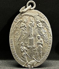 Antique Religious Medal Virgin Mary Archangel Defeating Demon Battle wonderful picture