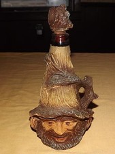 VINTAGE OLD MAN DECORATED OVER BEER BOTTLE WiTH HANDLE CORKED TOP picture