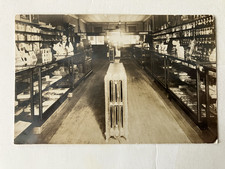 RPPC  STORE INTERIOR PHOTO POSTCARD MAILED IN 1909 FROM JACKSON, MICHIGAN picture