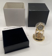 Vintage Sharp Miniature Brass Quartz Anniversary Clock Torsion Pendulum Novelty picture