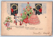 c1905 Christmas Mother And Child Decorating Christmas Tree Embossed Postcard picture
