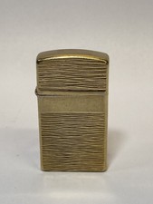 Vintage 1976 Zippo Gold Tone Bark Texture Panel Pocket Lighter USA picture