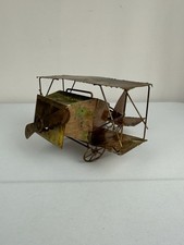 Vintage Weathered Tin Metal Biplane With Wind Up Music Box  picture