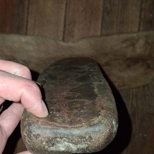 This object is an authentic prehistoric stone roller pestle, Native American picture