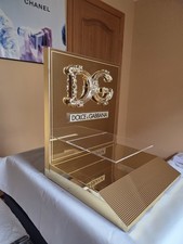 NEW DOLCE & GABBANA SUNGLASSES DISPLAY,  2 SHELVES UNIT. GOLD & BLACK  7 LB 6 OZ picture