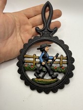 Vintage Dalecraft Cast Iron 7 5/8” Amish Man Trivet picture