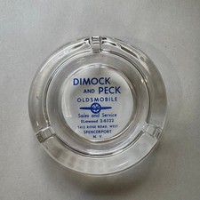 Vintage Dimock and Peck Oldsmobile Spencerport NY Glass Advertising Ashtray picture