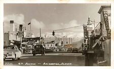 Anchorage AK 4TH Avenue Storefronts Old Cars Truck  RPPC  By Johnston picture