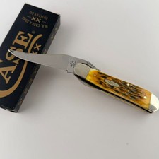 Case xx 00260 Peach Seed Jig Amber Bone RussLock Stainless Folding Pocket Knife picture