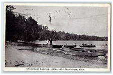 1926 Chesbrough Landing Indian Lake Boats On Shore Line Manistique MI Postcard picture