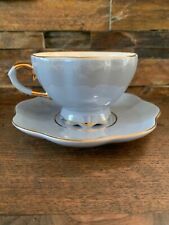 Graces  Teaware Solid  Blue With Gold Trim Tea Cup & Saucer picture