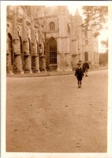 Vtg B&W Snapshot Boy in Cap Jacket Shorts By Gothic Cathedral Church 1920s picture