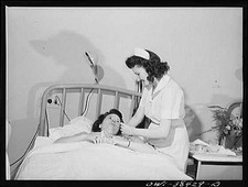 Photo:Washington D.C. 1940s Nurse Student at Bedside in Hospital Room picture