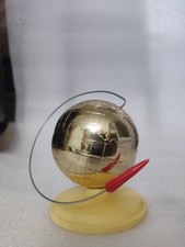 A globe with a space rocket. Soviet souvenir on the table, April 12, 1961,... picture
