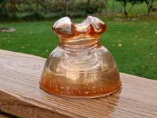 Beautiful carnival CD 324  pyrex 63 glass insulator. VNM except for a small chip picture