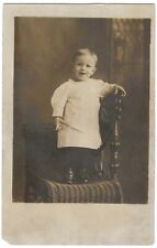 RPPC Postcard Smiling Small Child on Chair, Real Photo Studio Portrait picture