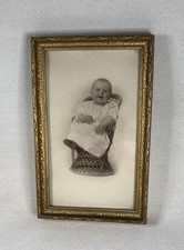Framed Photo Of Smiling Baby Seated In Wicker Chair 1920s Instant Ancestor picture